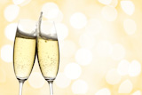 two,glasses,of,sparkling,wine,with,copyspace,and,abstract,lights,background